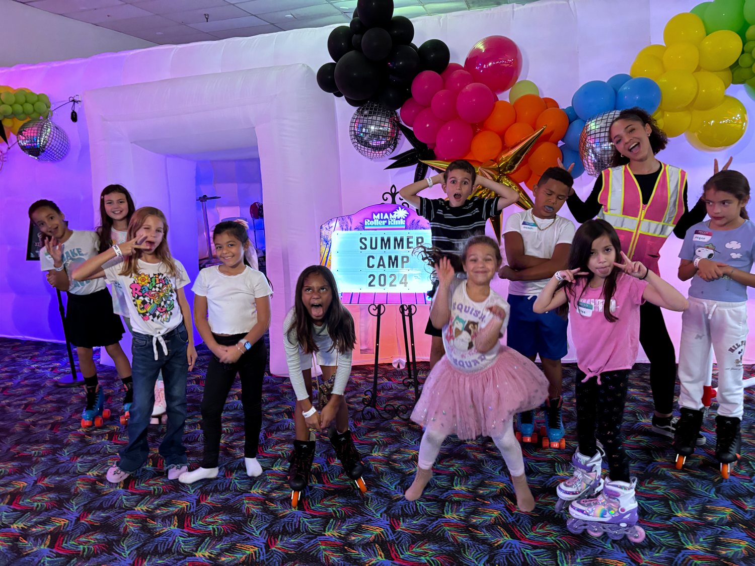 Kids enjoying summer camp activities at Miami Roller Rink