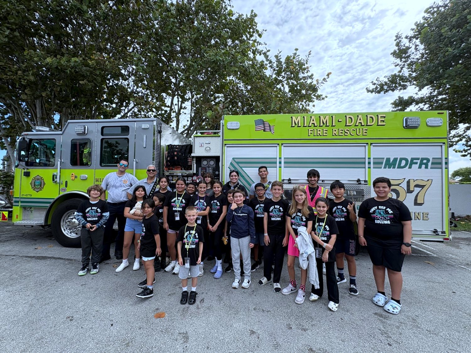 A school group gathered on the skate floor at Miami Roller Rink during a field trip